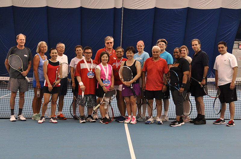 group photo Montgomery Tennisplex and Tennis WinWin Racquets and Rockets Adult Tennis and Fireworks Party 2017